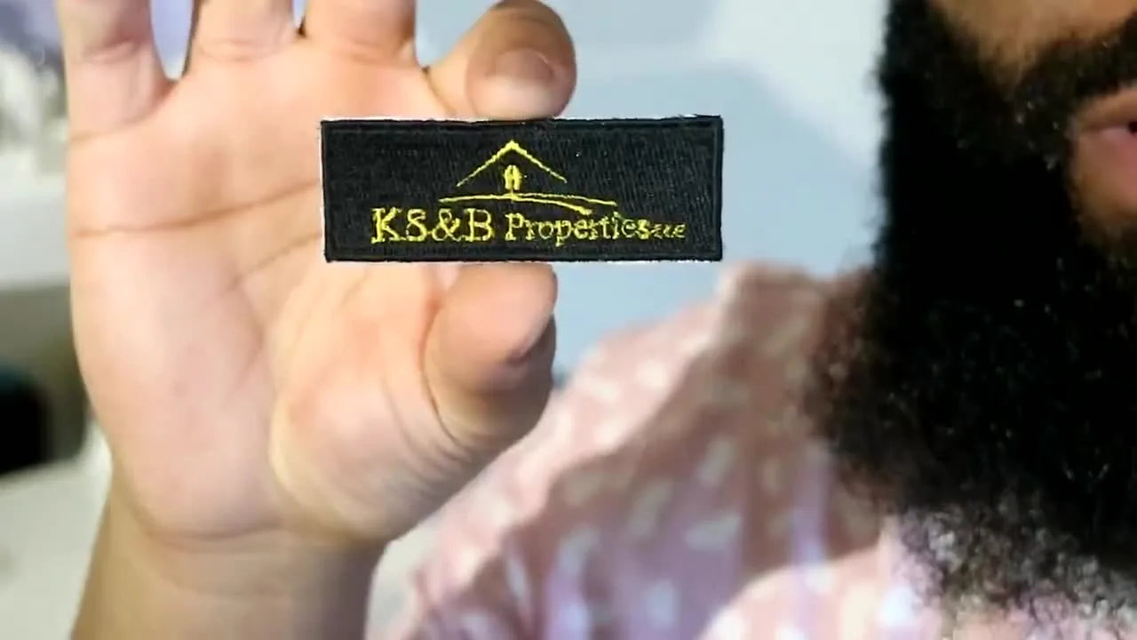 Holding a finished embroidered patch