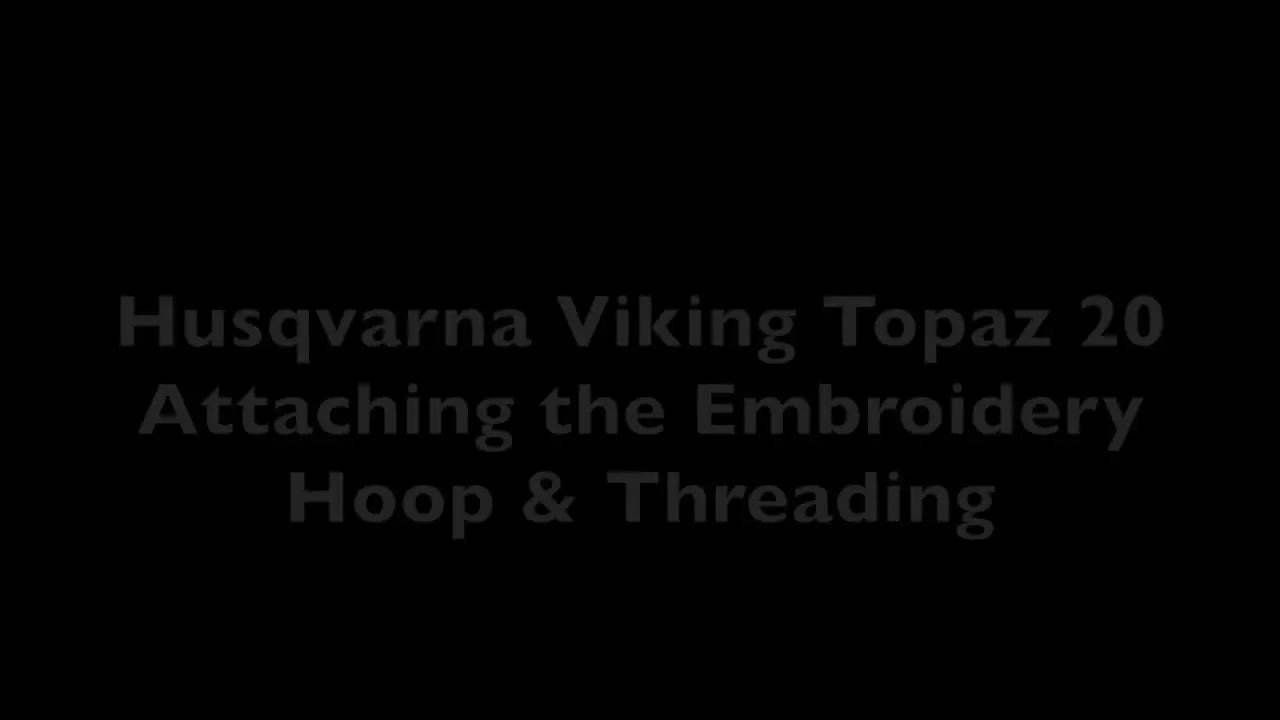 A close-up view of the Husqvarna Viking Topaz 20 as it’s being prepared for embroidery setup.