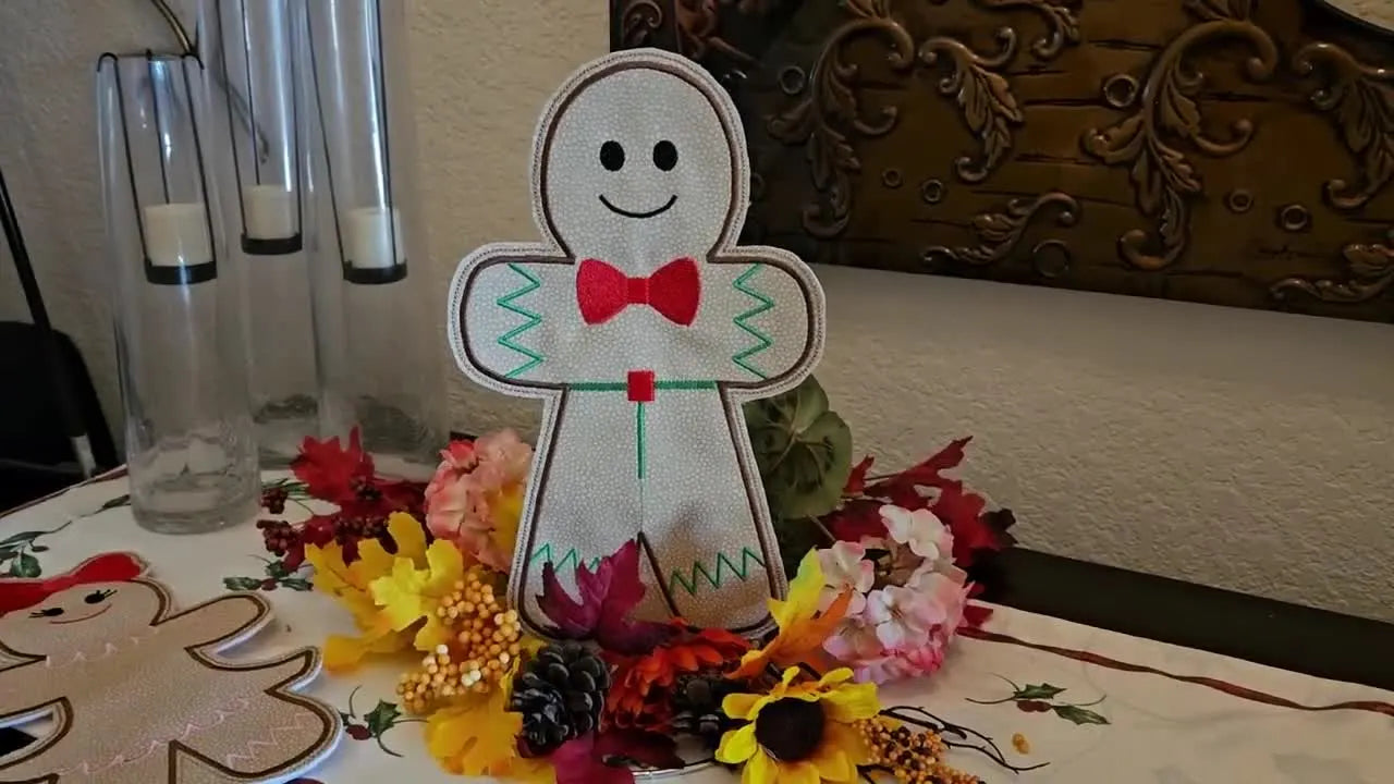 The finished Gingerbread Boy towel holder stands upright as a festive, functional paper towel holder decoration.