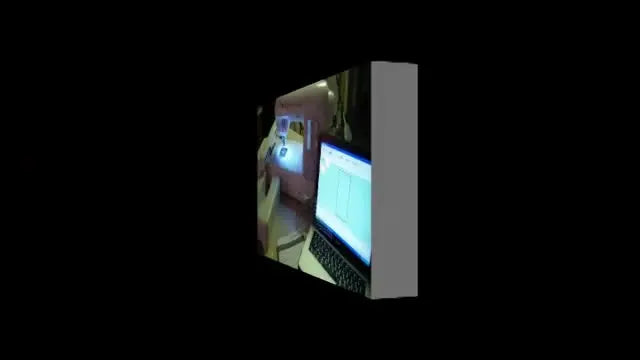 A freshly unboxed Singer Futura Quintet sits on a table with blue shipping tape still visible, ready for first-time setup.