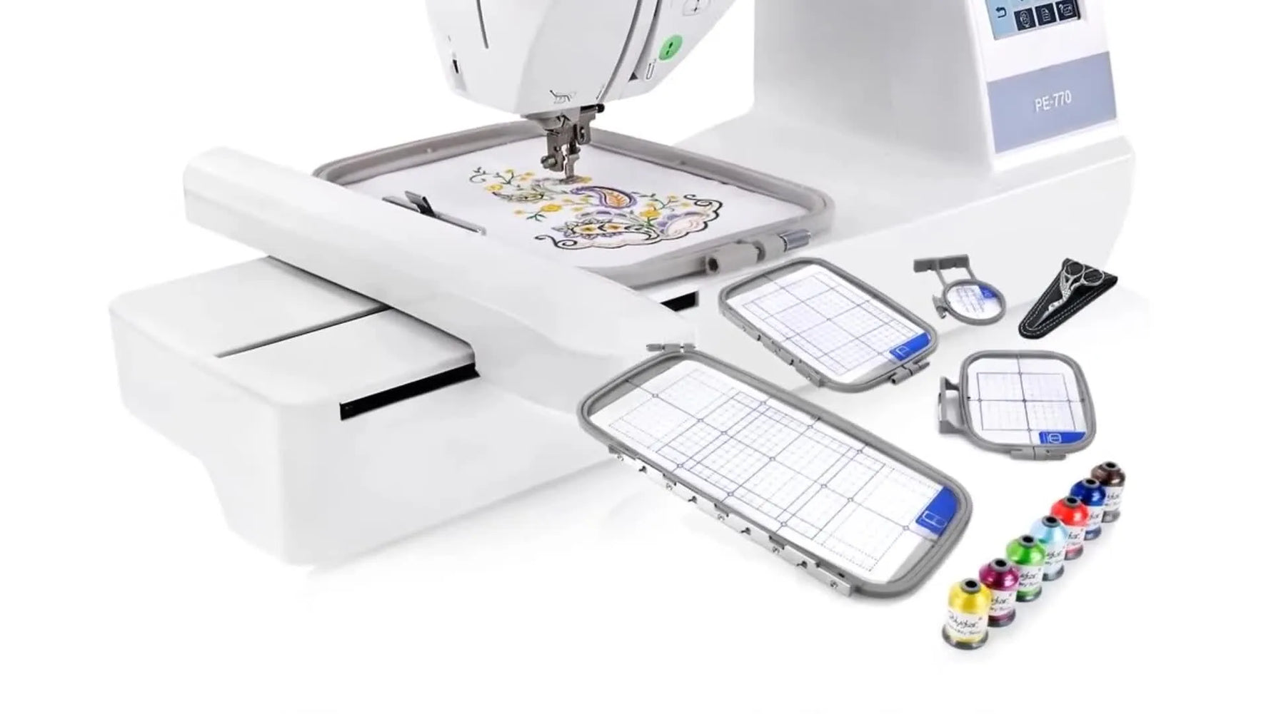 A close-up of the Brother PE770 stitching an intricate paisley design with an on-screen “checked” confirmation overlay.