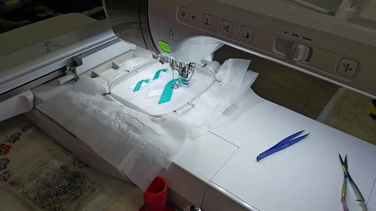 One Hoop, Two Products: Stitching Teal-and-White Cervical Cancer Ribbon Earrings + a Gift Tag on a Baby Lock (Without the Usual Thread Drama)