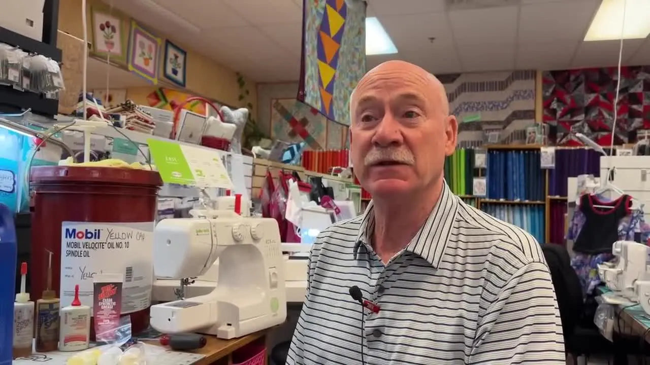 Bernina Jeff introducing several sewing machine oils on his workbench.