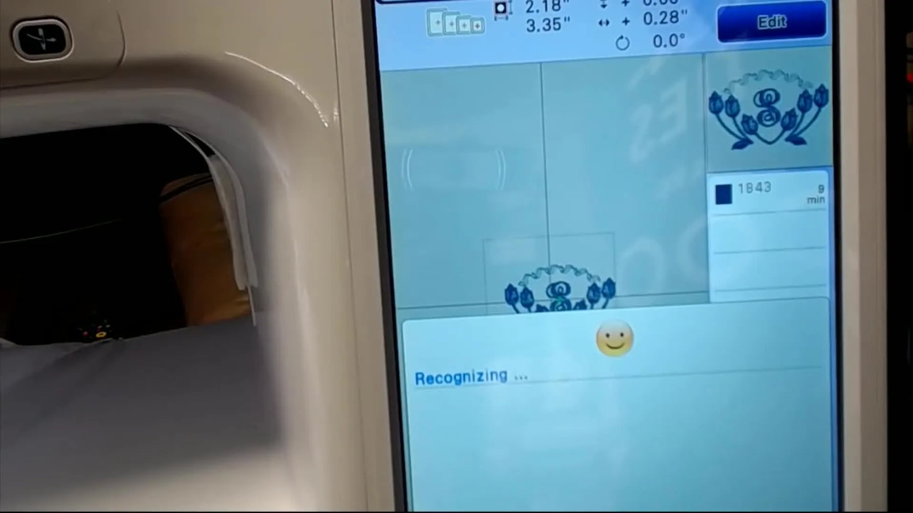 The Brother Dream Machine scans the hooped handkerchief and displays “Recognizing,” letting you align the monogram precisely on-screen before stitching.