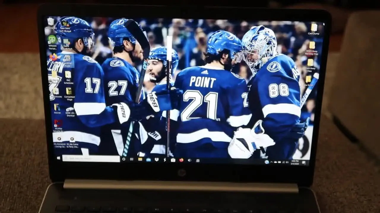 A laptop displaying a desktop background, ready to start the SewWhat-Pro tutorial.