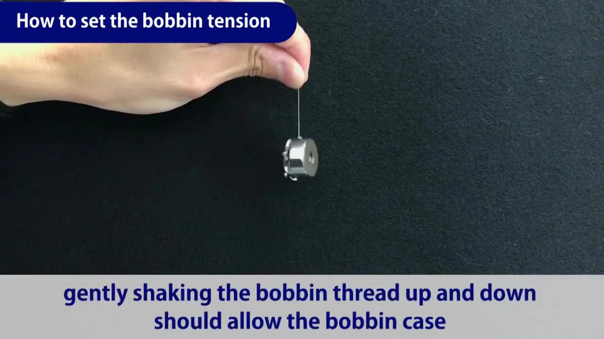 Hand performing bobbin shake test
