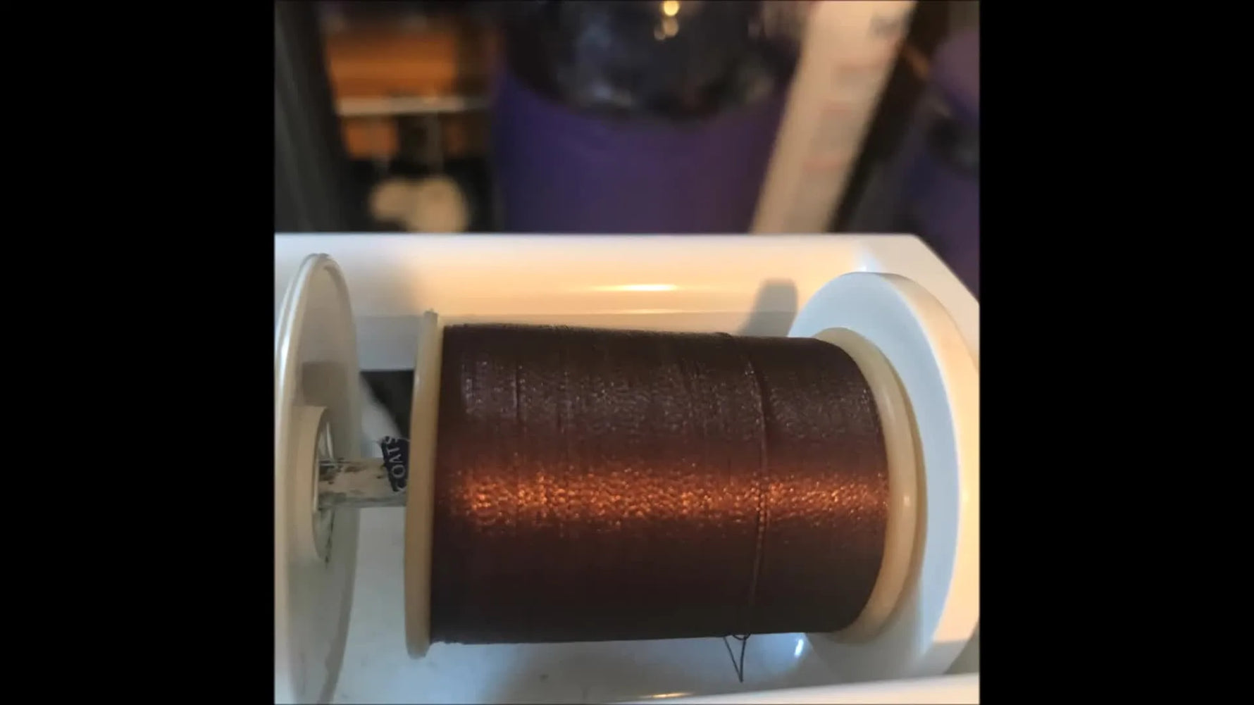 A fully stitched horse feltie on felt in the hoop, ready for the backing felt and final bean stitch.
