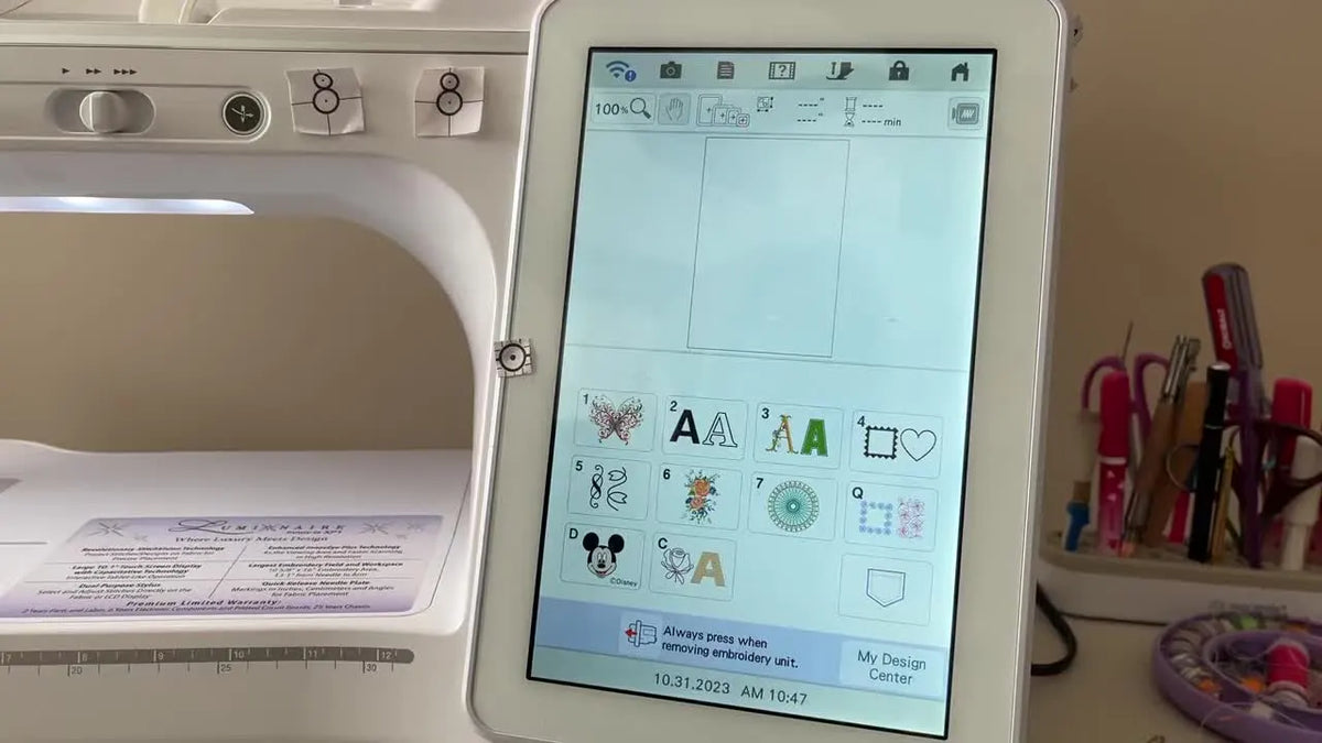 Brother Luminaire embroidery machine display showing built-in font options.