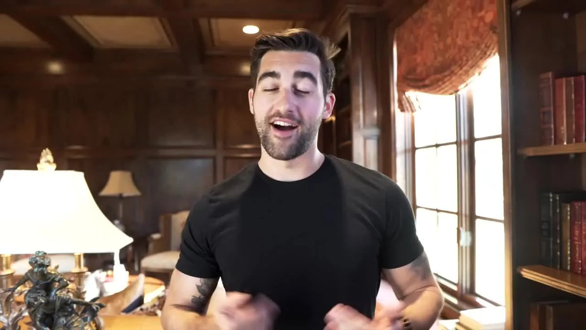 Presenter introducing how to start a fitness apparel brand on camera.
