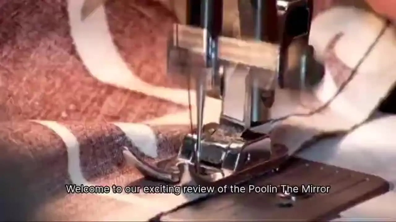 A full kit layout of the Poolin “The Mirror” machine with stand, cap attachments, hoops, thread kit, and tools arranged for a promotional display.