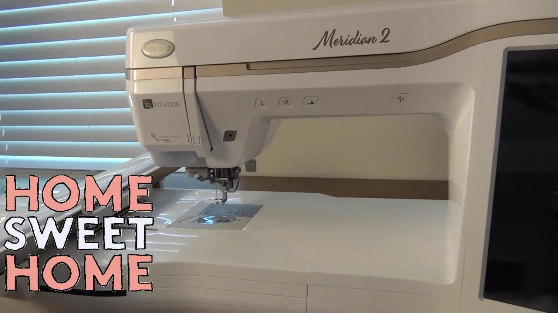 The Baby Lock Meridian 2 powered on for the first time with the LED workspace lights illuminating the sewing bed.