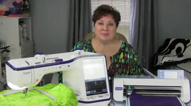 Woman smiling with Brother embroidery machine and ScanNCut
