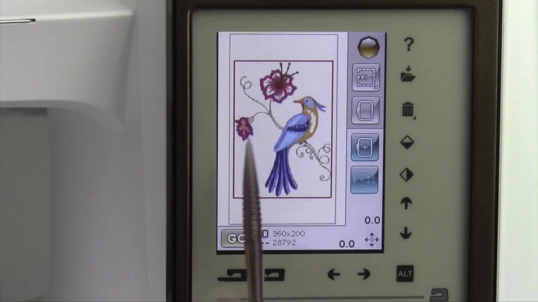 The Topaz 50 screen displays a loaded bird-and-flower embroidery design in full color with the 360x200 hoop size indicator visible.