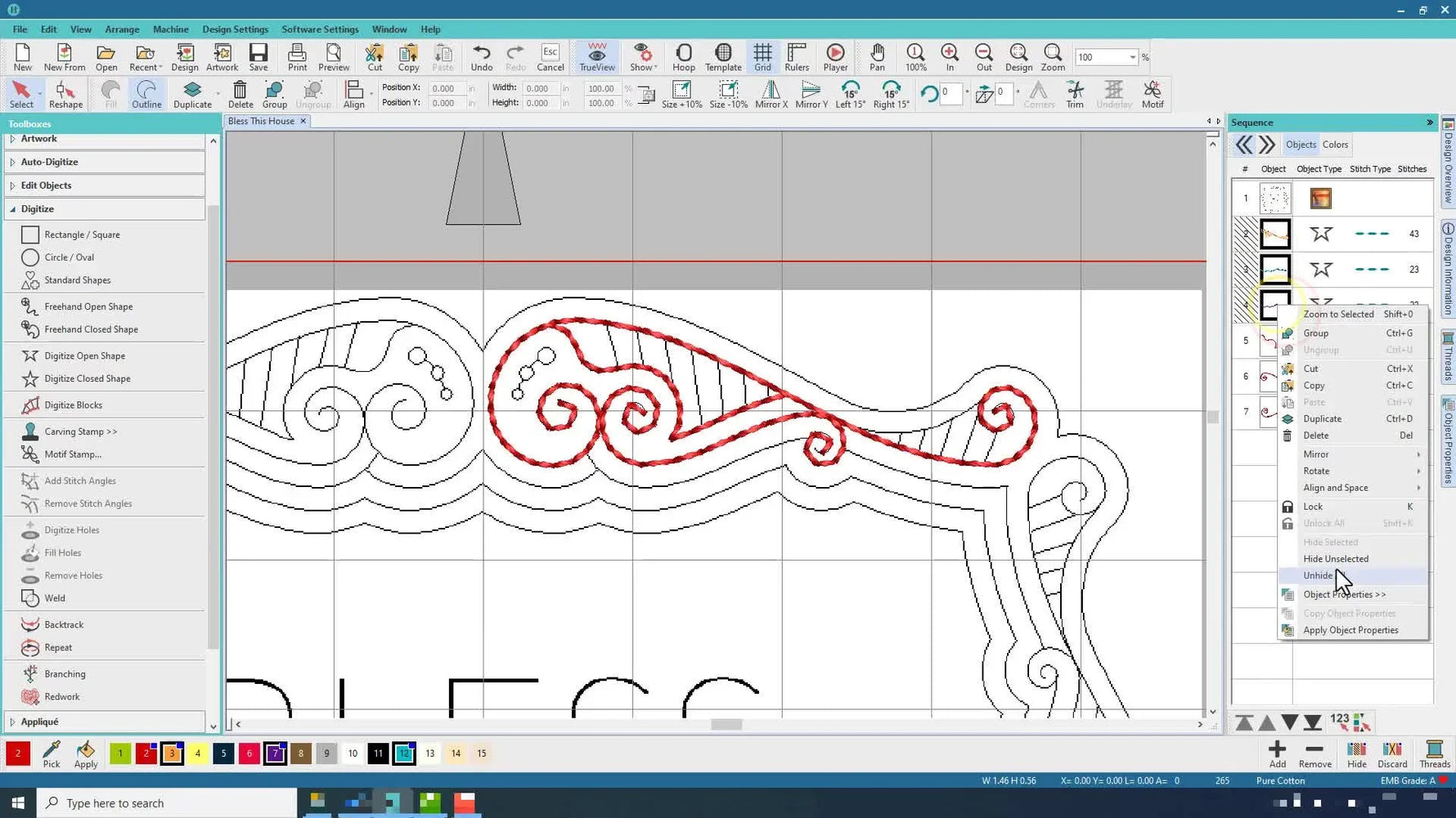 Embroidery software showing the full design with several digitized sections, including spirals and frame lines, in different colors.