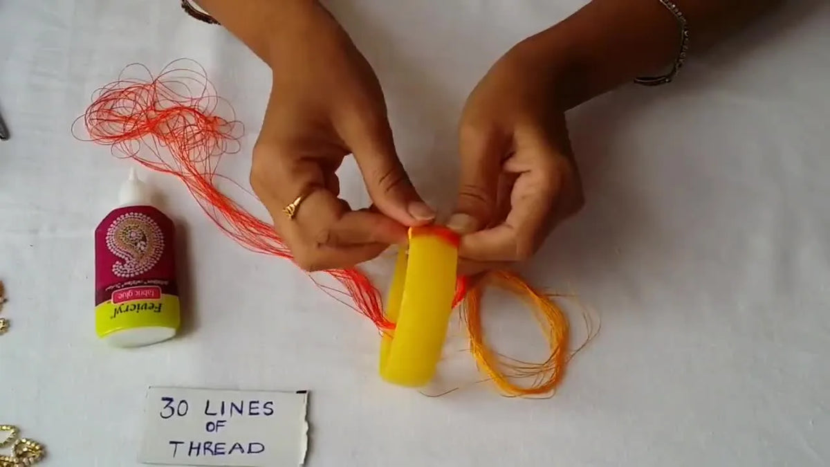 Alternating red and yellow threads creating a zigzag pattern.