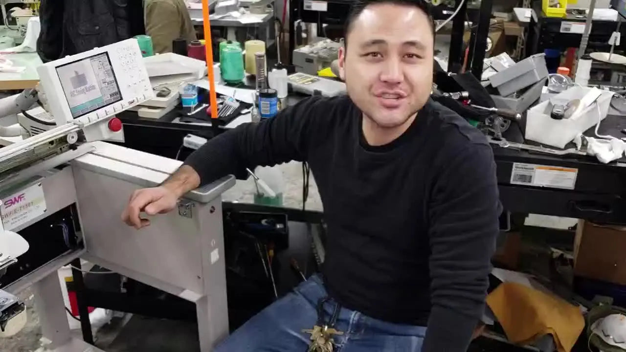 Man explaining how to format an SWF embroidery machine