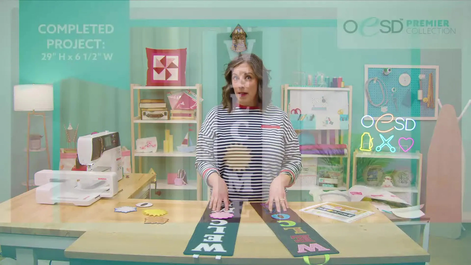 A finished vertical “WELCOME” sign hangs in a window with a bright sun element attached at the center tile.