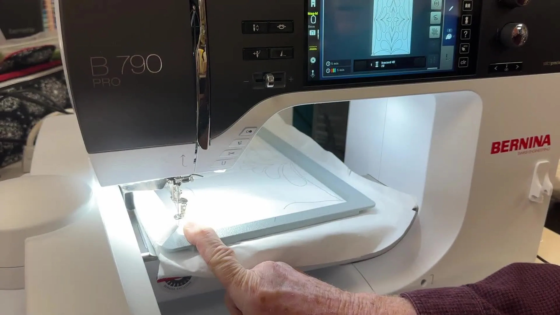 Jeff uses the Bernina 790 PRO multifunction knobs on the Stitch Sequence screen to move the hoop and recover the exact stitch position after a hoop recognition reset.