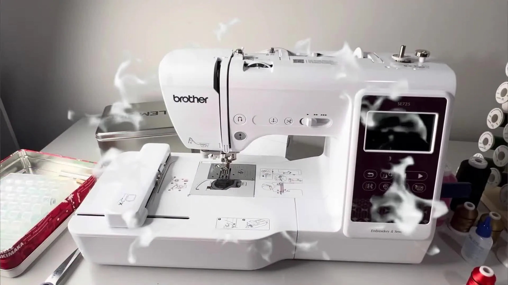 A wide view of the Brother SE725 embroidery setup with the touchscreen lit, ready to stitch a patch.