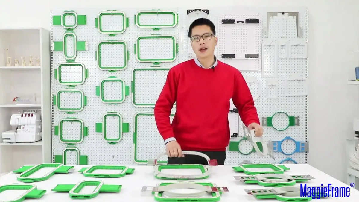 Man holding a Ricoma two-builder hoop, demonstrating its design.