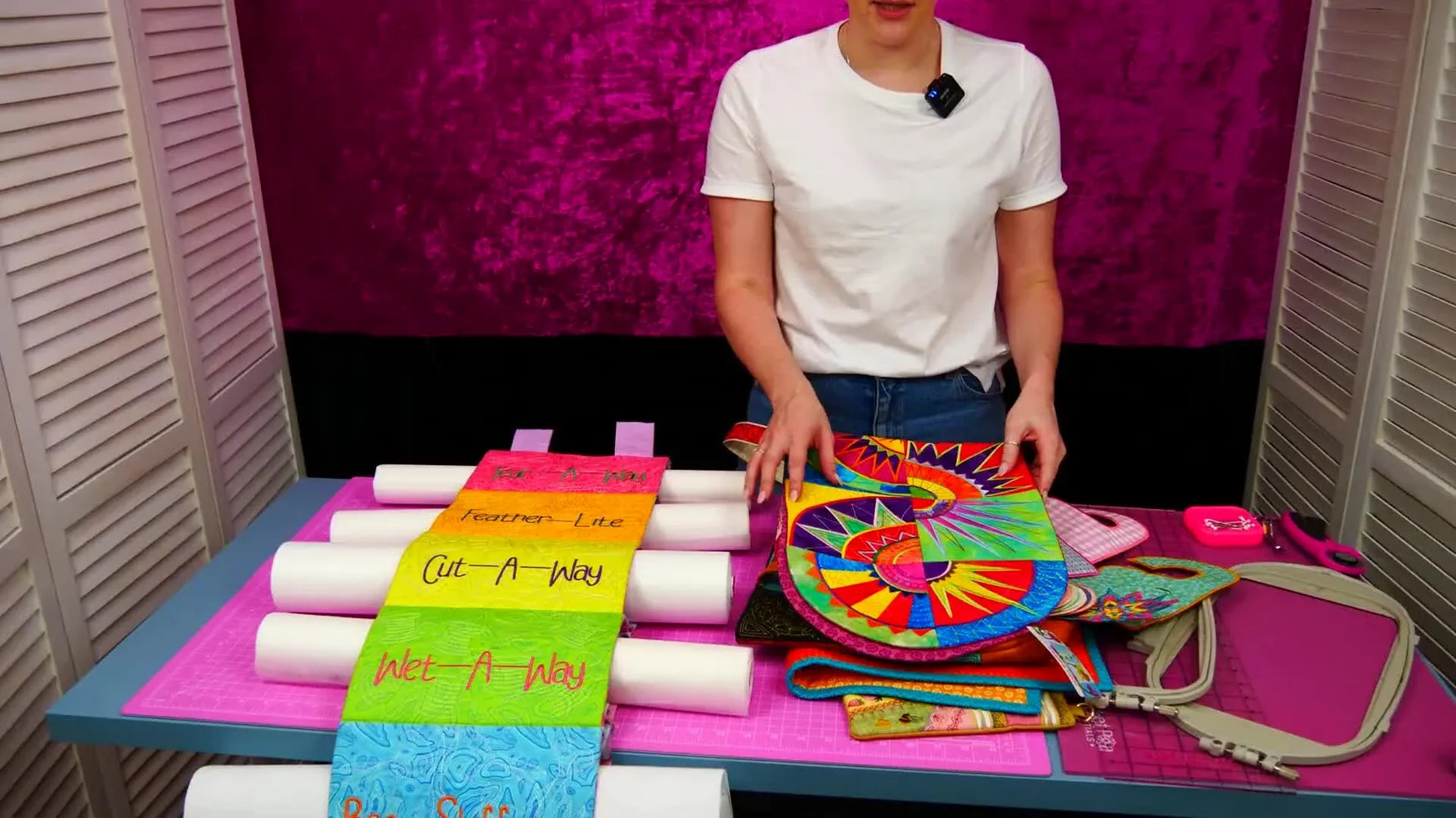 A row of stitched fabric samples labeled with each stabilizer type, showing how different backings behave in real embroidery.