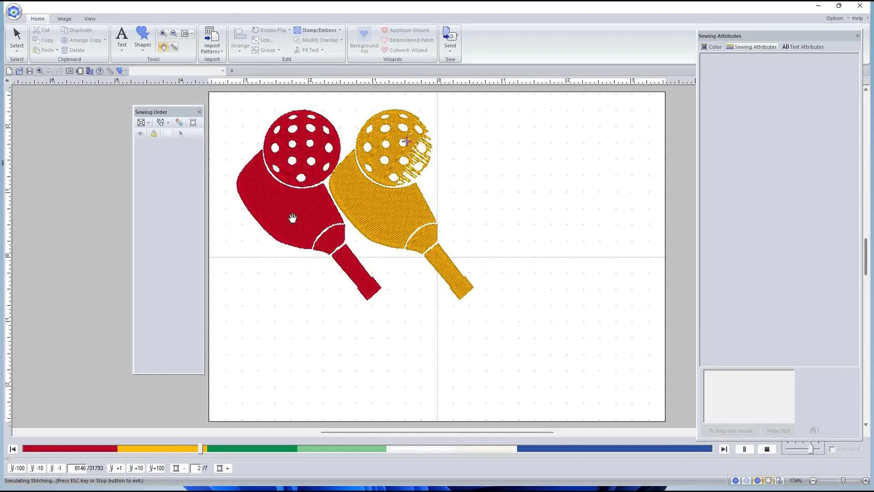 A full on-screen preview of the pickleball paddles and balls before the text stitches, showing the clean graphic base in the stitch simulator.