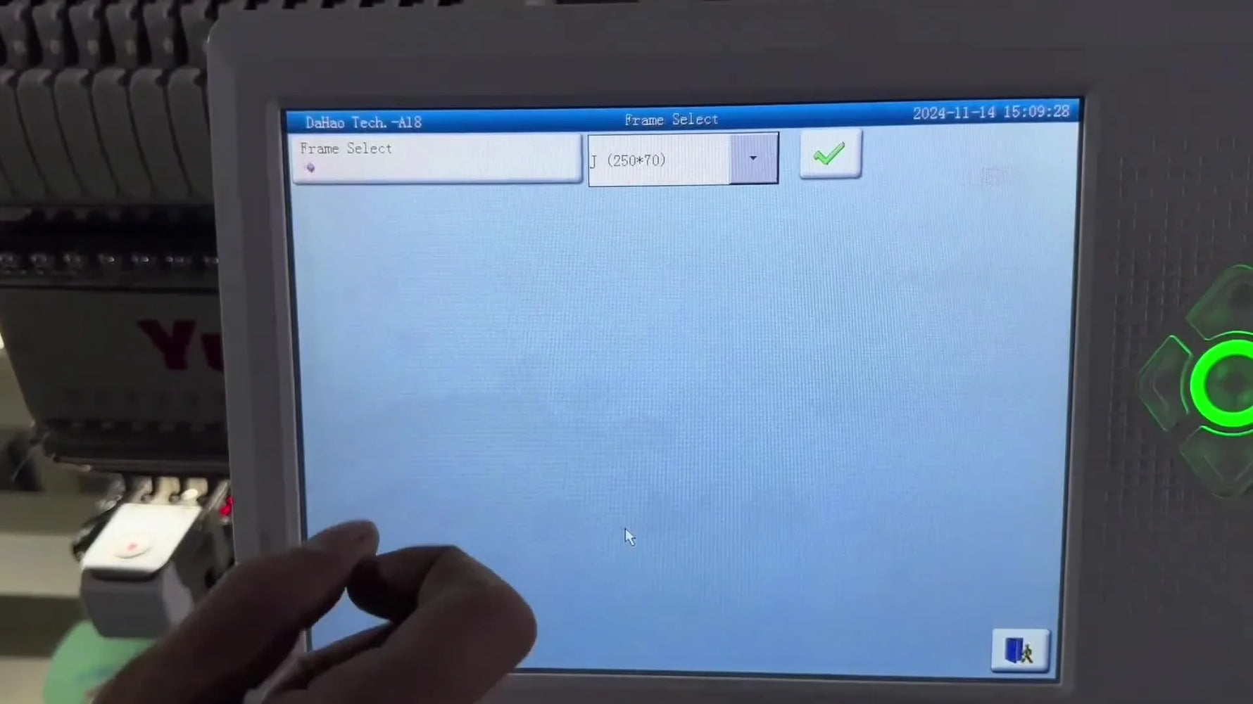 The Dahao control panel highlights the J Frame selection used to flip the machine into cap embroidery orientation.