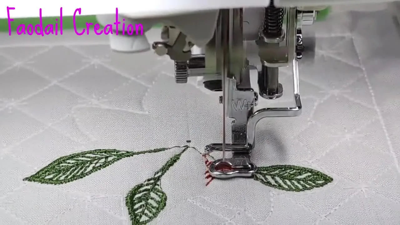 A red poinsettia stitches out crisply in the center of a quilted fill, showing the finished look of the in-the-hoop coaster on the Baby Lock Altair 2.