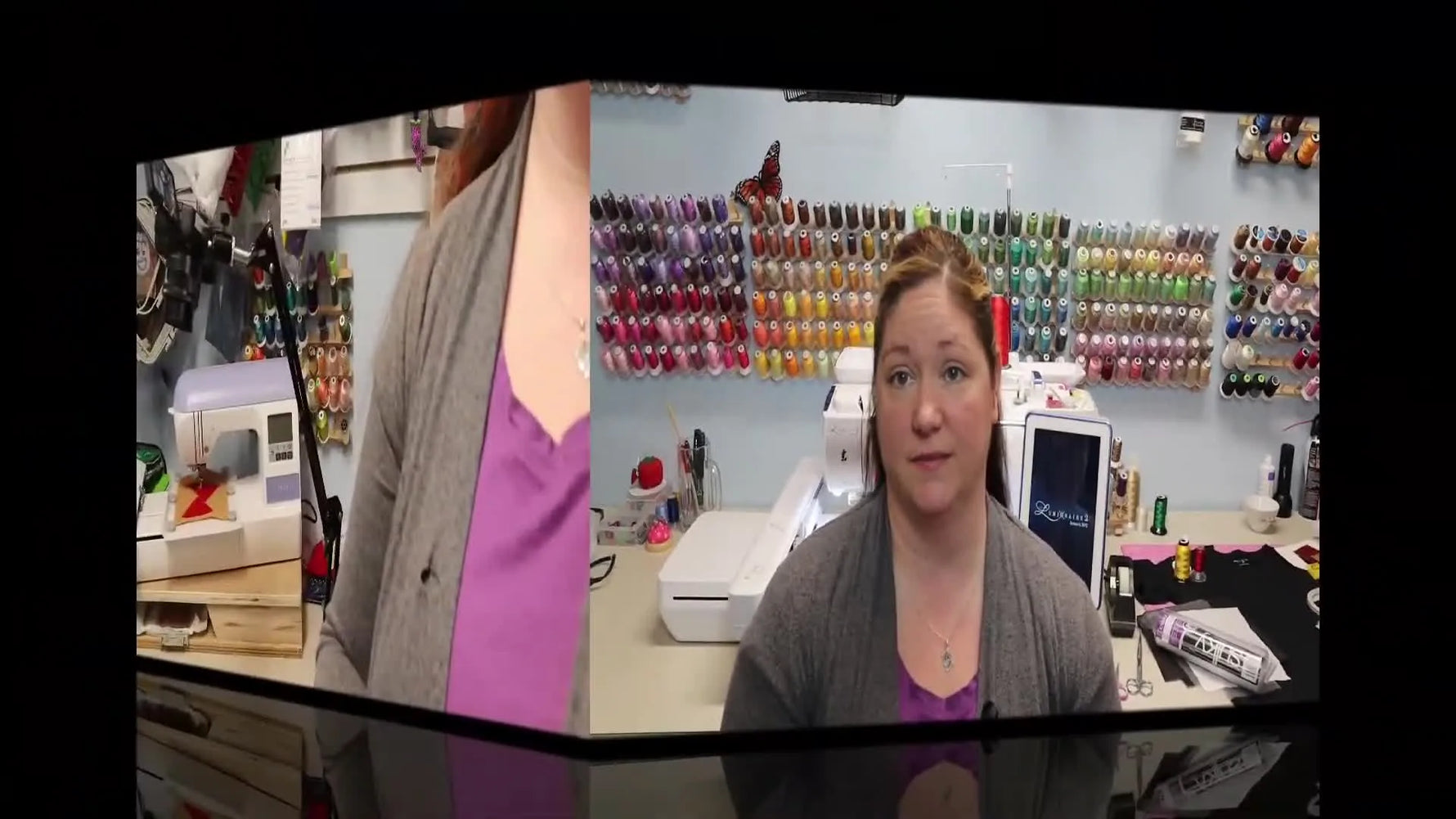 A flat lay of all embroidery tools and materials needed, including stabilizers, threads, appliqué pieces, and a black children's t-shirt.