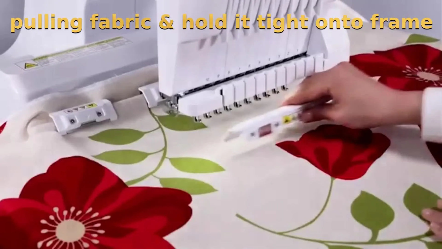 Hands pull fabric taut while snapping the bottom magnetic sash onto the Brother PRMS360 frame for a smooth, wrinkle-free hoop.