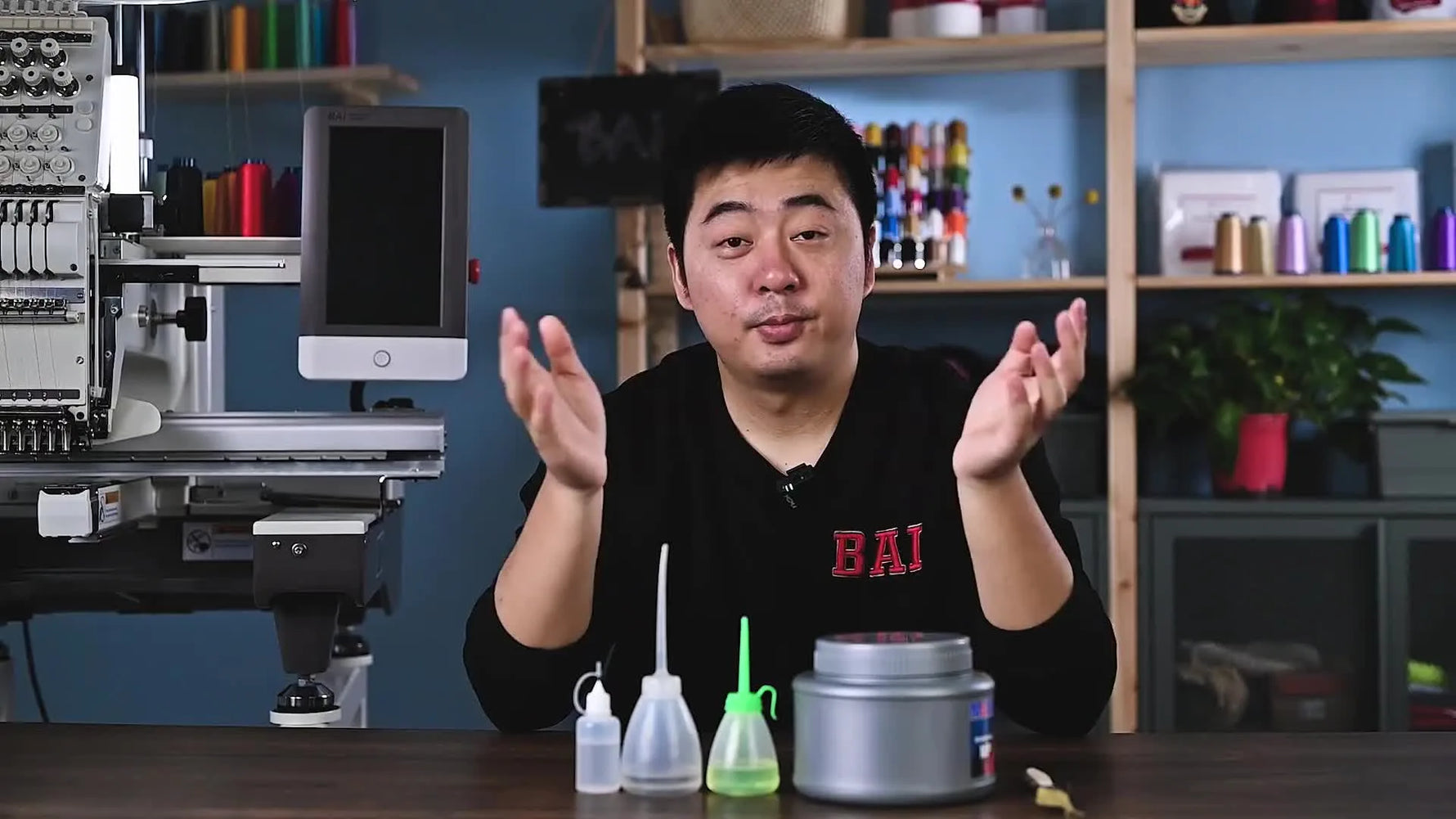 Man presenting lubrication tools and oils