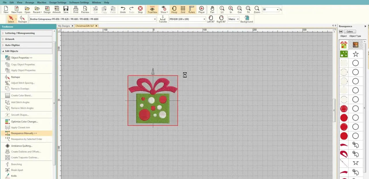The finished Christmas gift box design is fully rendered in Hatch with textured bow fills and clean punched-out polka dots.