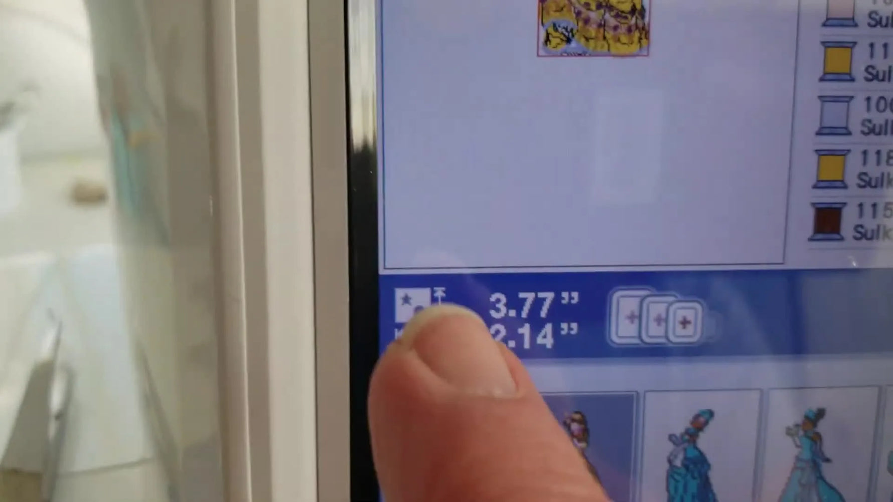 Close-up of the Brother Innov-is 6700D screen showing design dimensions and the three hoop-size icons used to confirm hoop compatibility before stitching.
