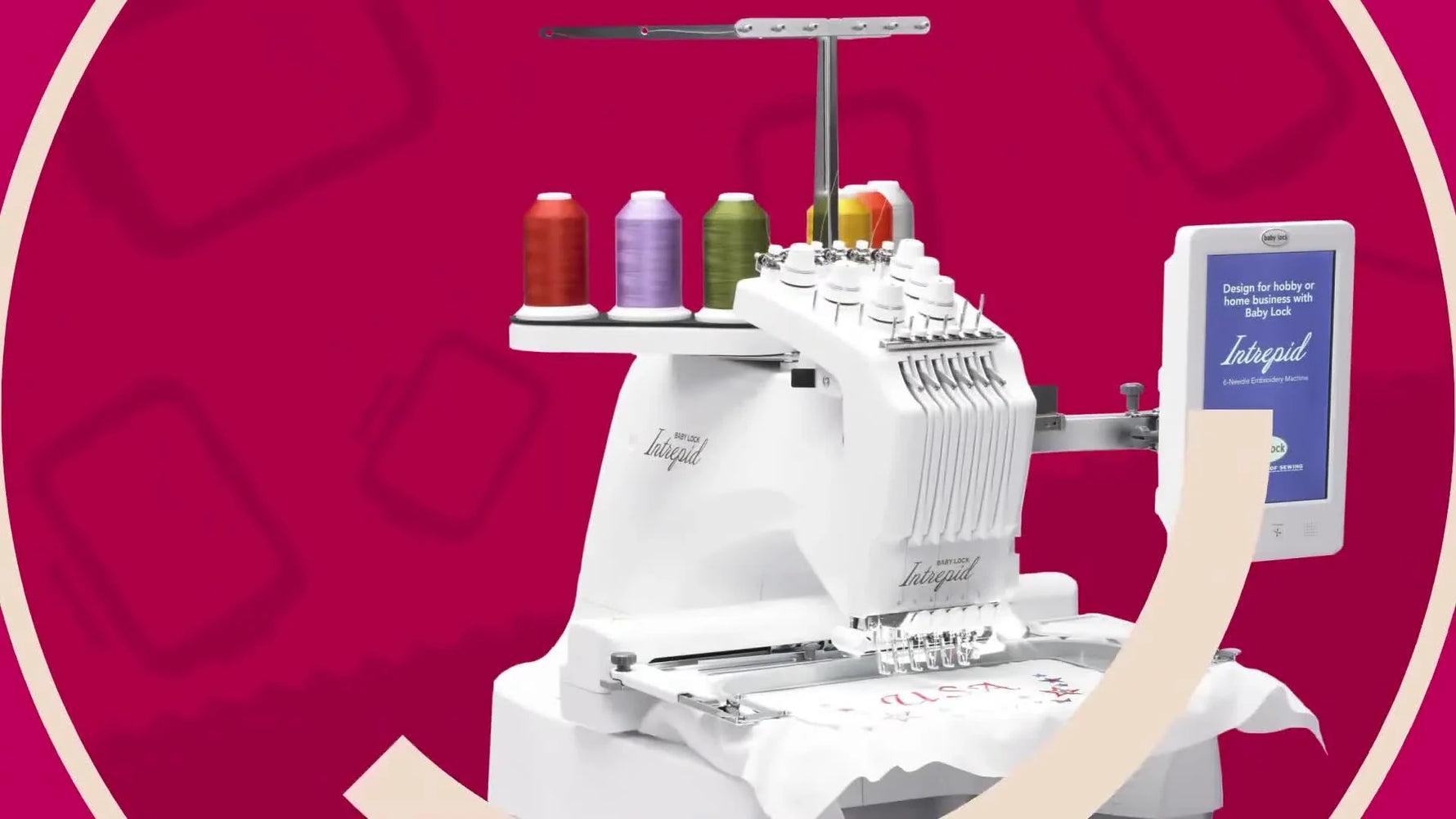 A wide view of the Baby Lock Intrepid 6-needle embroidery machine fully threaded and ready for a production-style run.