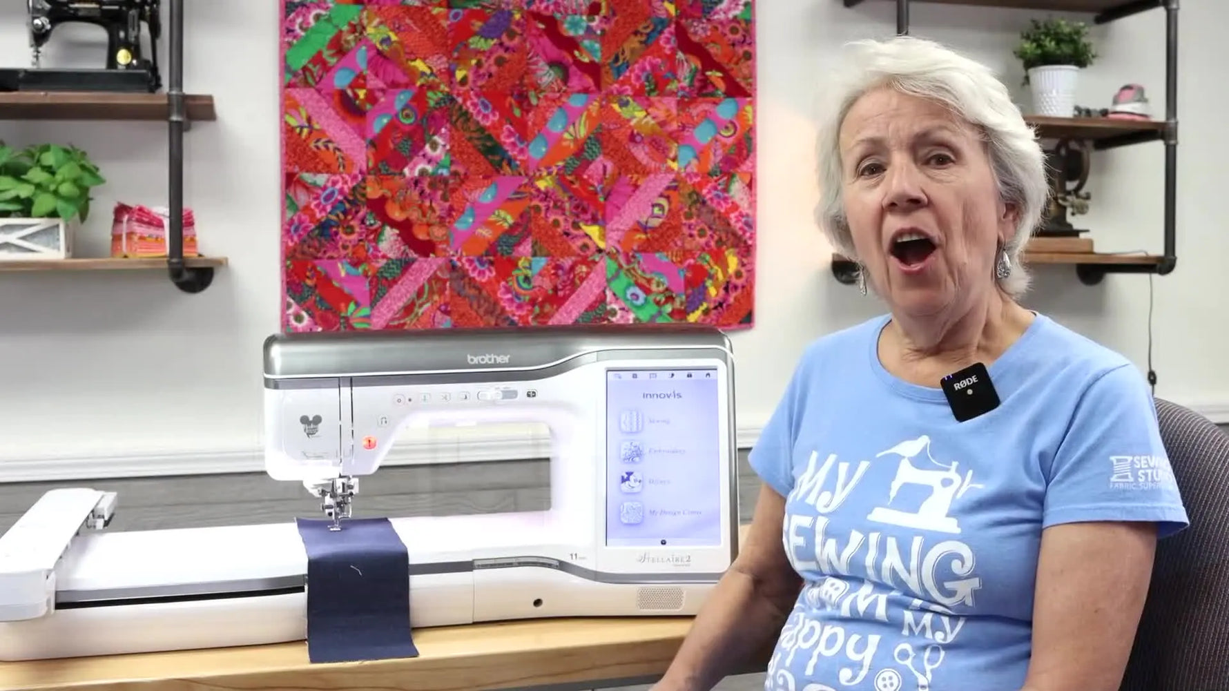 A wide shot reveals the Brother Stellaire XJ2, emphasizing its large workspace and premium combo-machine presence.