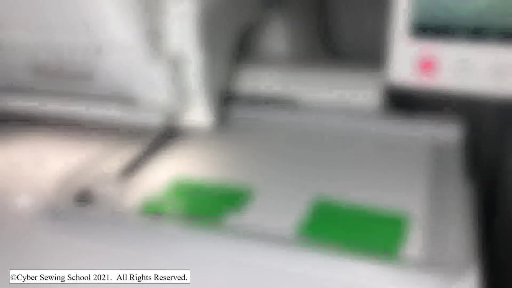 A wide view of a Baby Lock Valiant with the Scan Mat laid on the machine bed, ready to be installed.