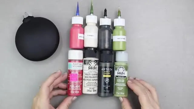 Flat lay of ornament and paints