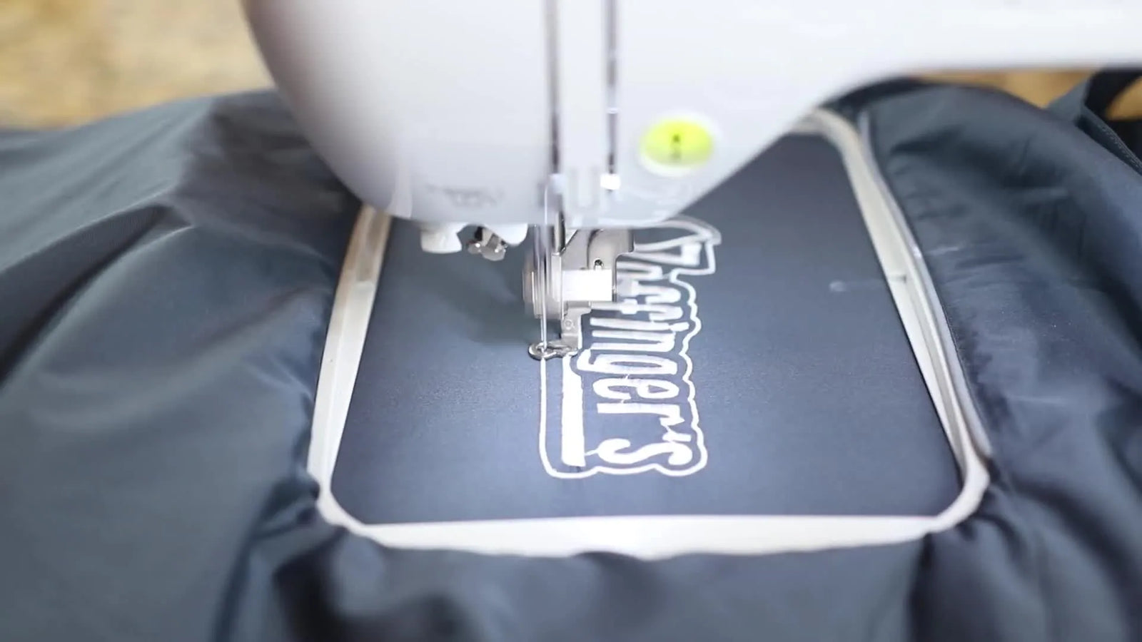 Embroidering a Nylon Windbreaker on a Brother PE800 Without Puckering: The Microtex + Cutaway “Lockdown” Method