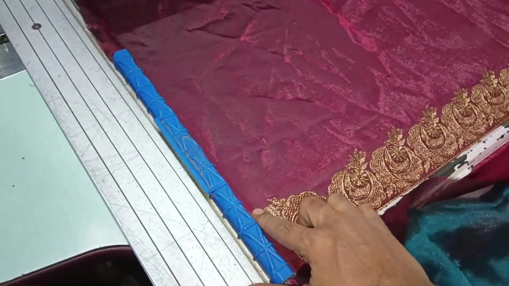 A close-up shows the one-finger gap rule at the front edge—an essential spacing check to prevent over-limit errors during framing.