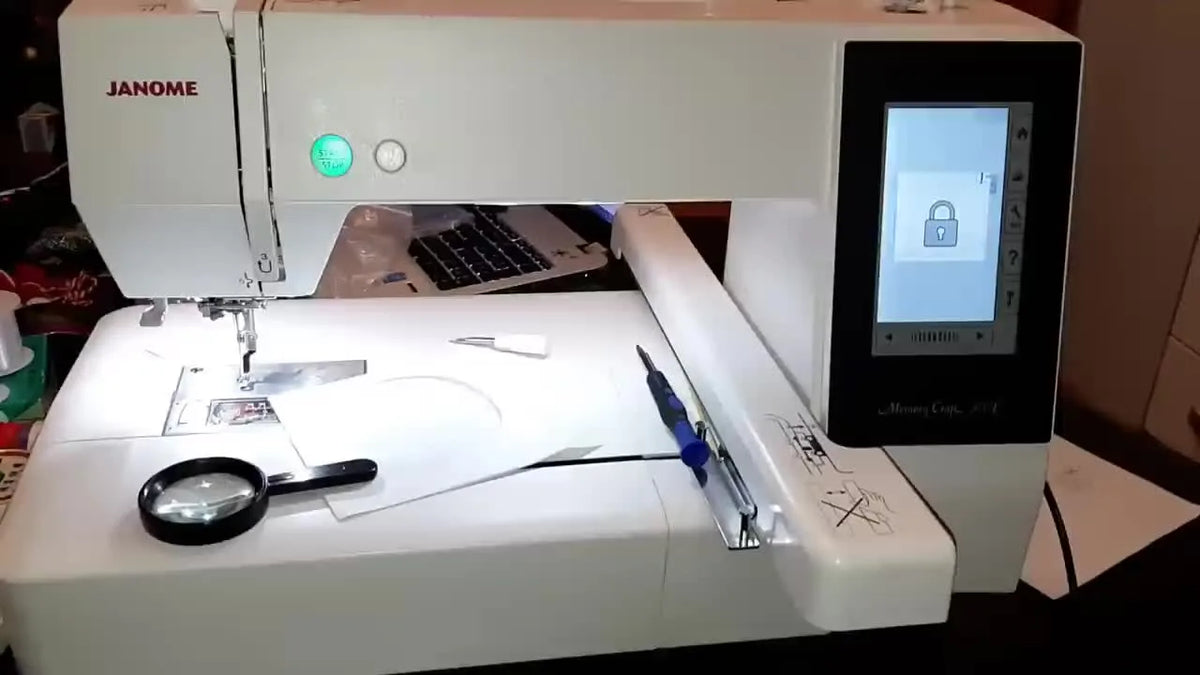 Janome Memory Craft 500E embroidery machine with bright workspace light