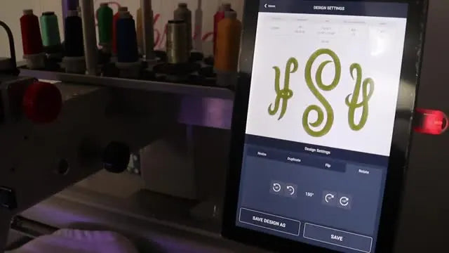 The Ricoma 10S panel rotate tool is used to flip a monogram design 180 degrees so it stitches right-side up on a hooped towel.