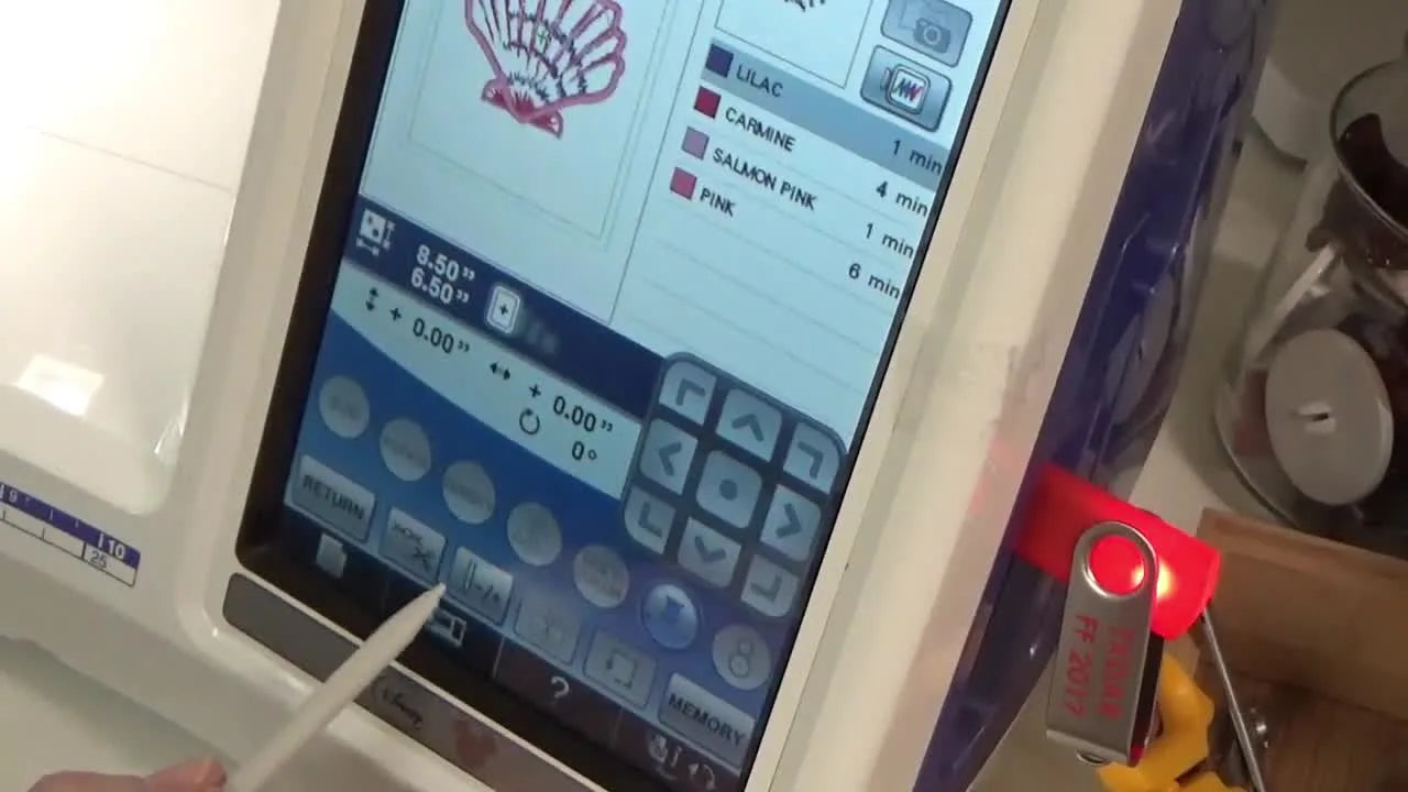 A close-up of a Brother embroidery machine screen with a finger pointing at the Needle +/- icon used to back up and restitch the correct appliqué step.