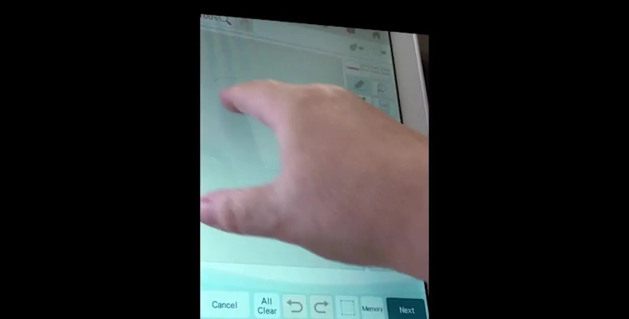 A close view of handwriting being drawn on the Brother Luminaire touchscreen, ready to be converted into stitches in My Design Center.