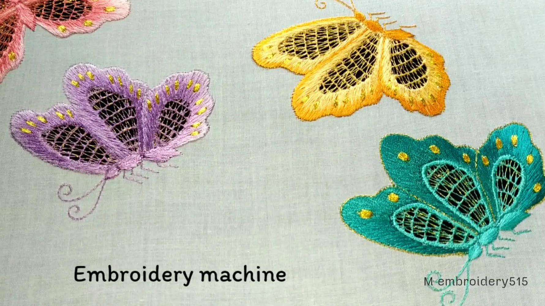 Four completed cutwork butterfly embroideries on light fabric, displaying various colors.