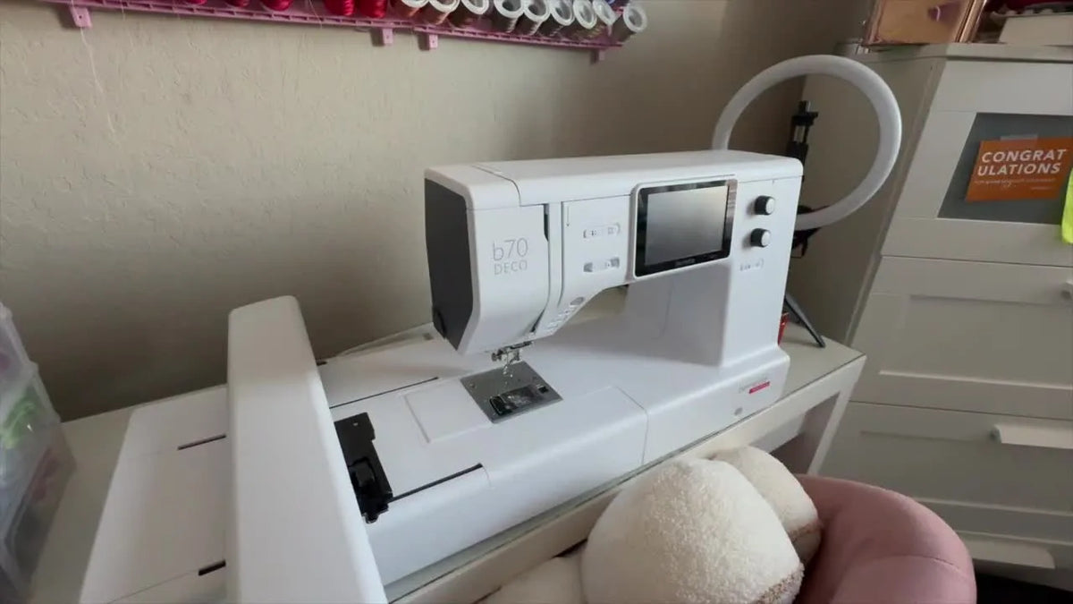 Bernette B70 DECO embroidery machine on a desk.