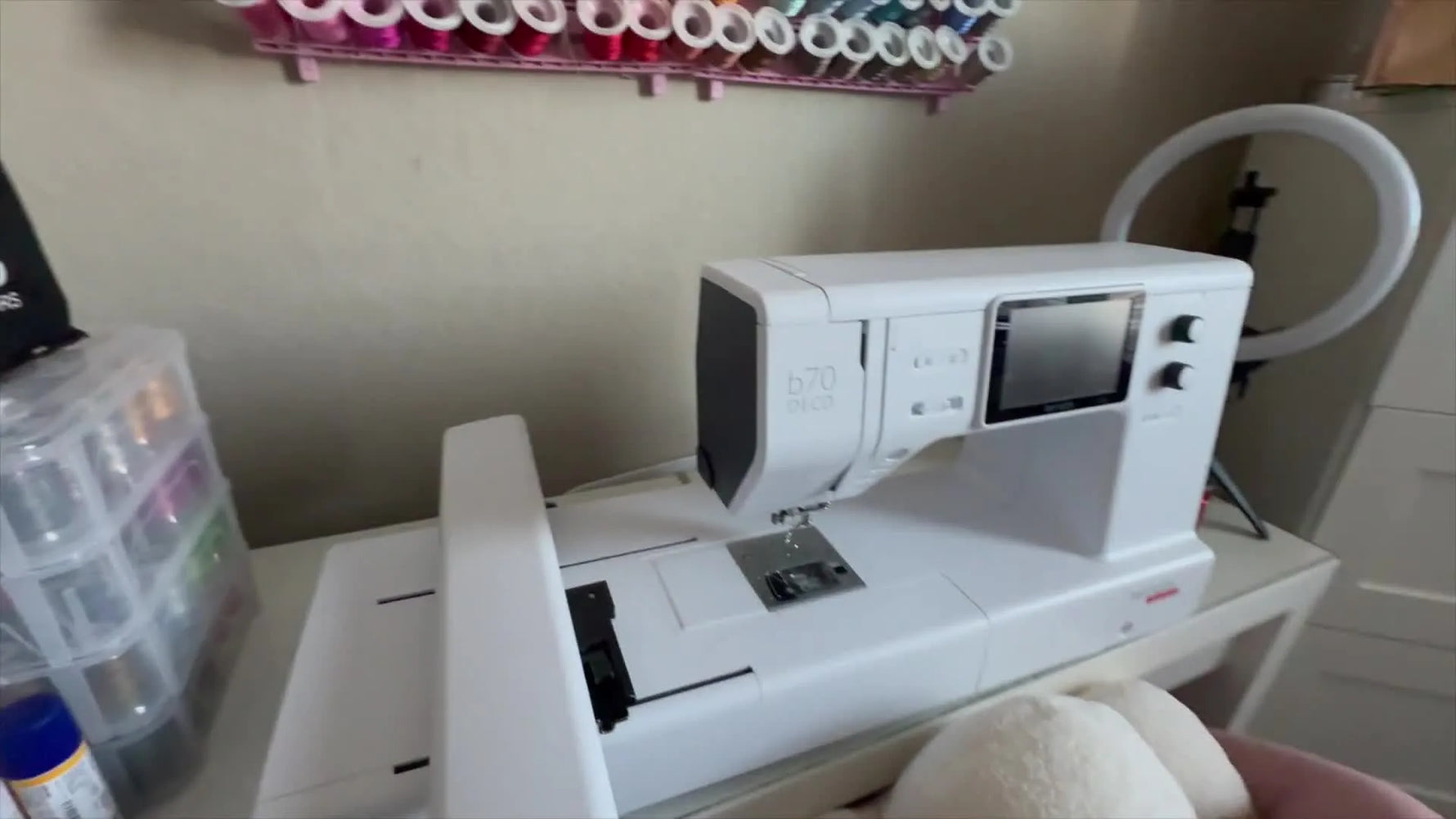 A wide view of the Bernette b70 DECO on a clean desk setup, ready for threading and embroidery.