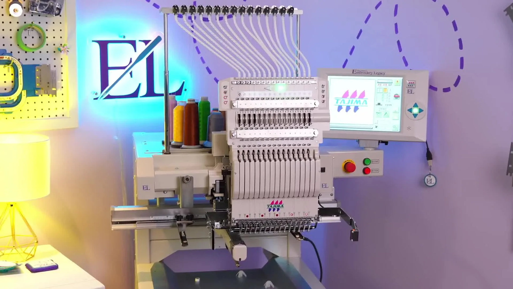 A full studio shot of the Tajima TMEZ‑SC with its thread rack and clean commercial footprint, setting the tone for a production-minded review.